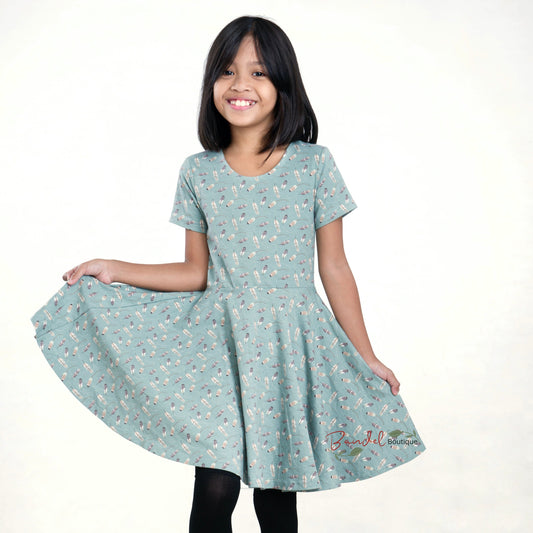 Girl's slim fit bodice circle skirt dress in jersey cotton.