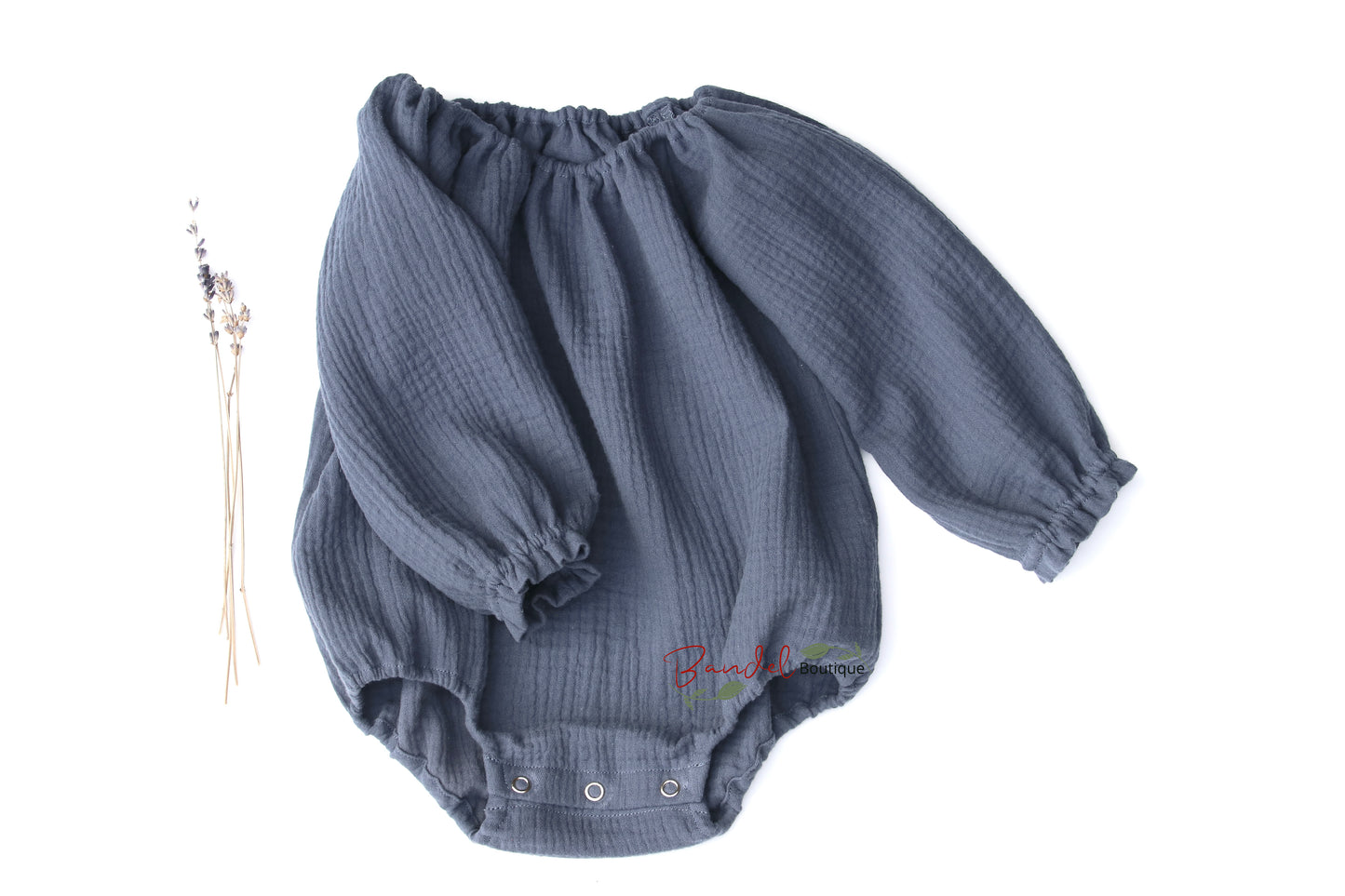 Handmade Jeans- Blue minimalist newborn baby romper with long sleeves, made from breathable and soft double gauze organic fabric. Features elasticized openings and crotch snaps for easy dressing and maximum comfort. 
