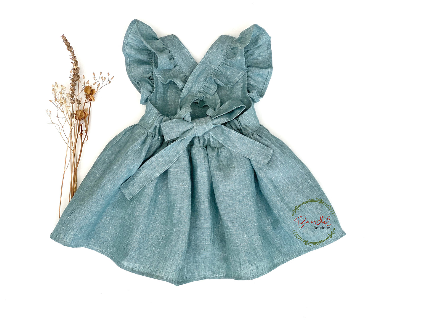 Dusty Mint Vintage Dress will give your little girl the perfect feminine look. It features delicate sleeve ruffles, adjustable straps, and a gathered skirt to make it comfortable and easy to wear. Its delicate dusty mint color is perfect for spring and summer days.