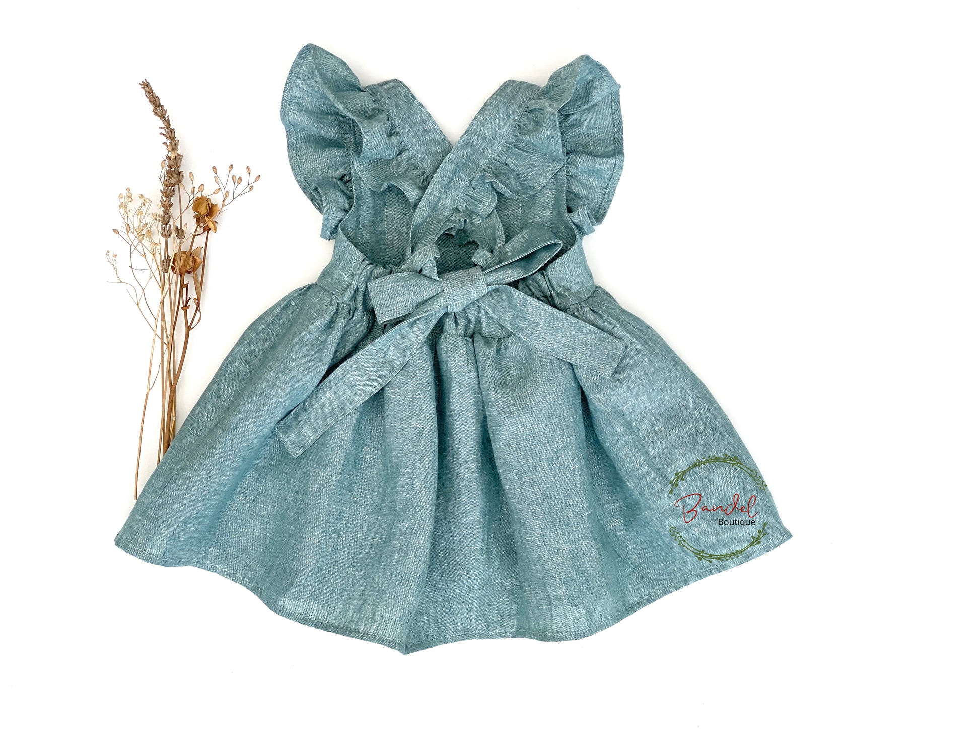 Dusty Mint Vintage Dress will give your little girl the perfect feminine look. It features delicate sleeve ruffles, adjustable straps, and a gathered skirt to make it comfortable and easy to wear. Its delicate dusty mint color is perfect for spring and summer days.