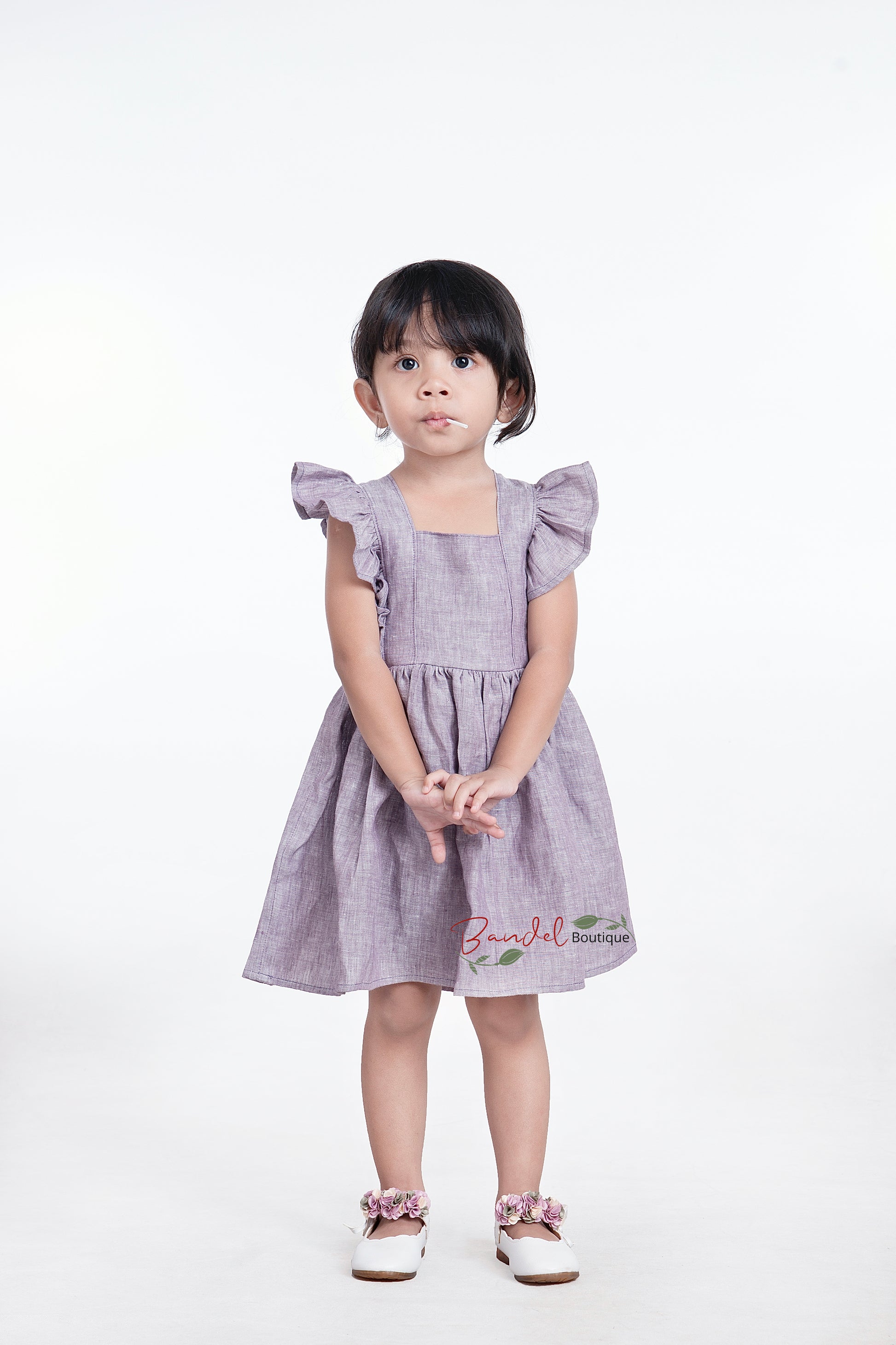 Timeless charm with our exquisite mauve linen dress for girls. Crafted from high-quality linen fabric in The Netherlands. This vintage-inspired dress features sleeve ruffles, adjustable straps, and a gathered skirt. The lightweight and breathable fabric ensure both comfort and sophistication. Perfect for weddings, birthdays, or family gatherings, this dress adds a touch of elegance to any special occasion. Available in various sizes. Create lasting memories in style with our mauve linen dress!