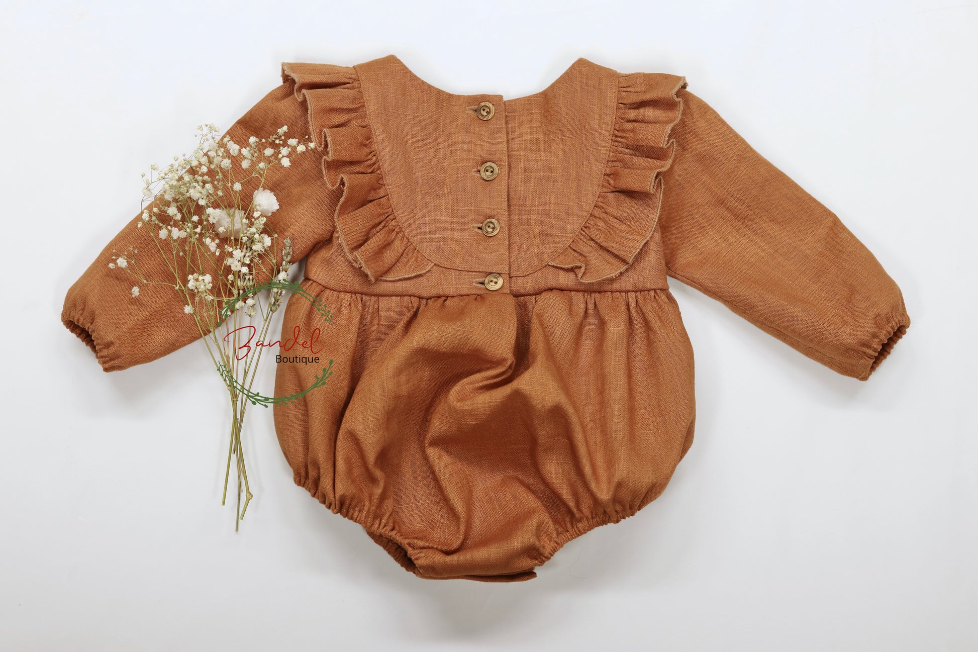 rust ruffles linen baby playsuit 